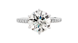 Stand out with this stunning round solitaire diamond ring.