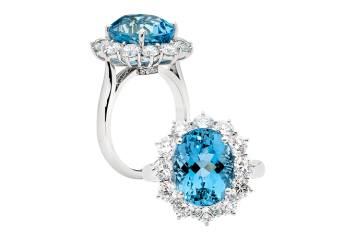 Oval brilliant cut and round brilliant cut aqua cluster diamond ring. Available in White Gold, Yellow Gold, Rose Gold or Platinum