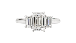 Stunning emerald cut Trilogy ring available in white gold or platinum.