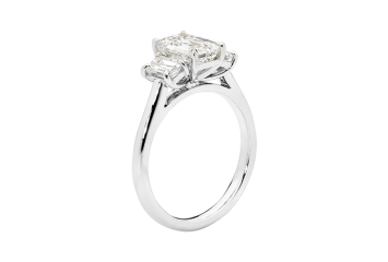 Stunning emerald cut Trilogy ring available in white gold or platinum. Available in White Gold, Yellow Gold, Rose Gold or Platinum