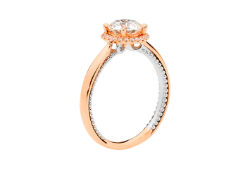 Round brilliant cut Halo ring available in rose gold. Available in White Gold, Yellow Gold, Rose Gold or Platinum