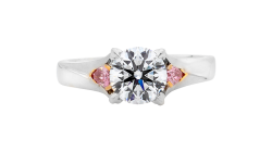Argyle pink round and pear brilliant cut ring available in platinum and white gold.