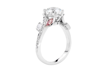 Round and marguise brilliant cut diamond ring available in white gold or platinum. Available in White Gold, Yellow Gold, Rose Gold or Platinum