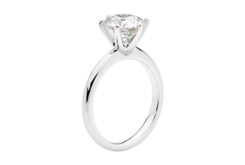 Classic Solitaire with round brilliant cut diamond available in white gold or platinum. Available in White Gold, Yellow Gold, Rose Gold or Platinum