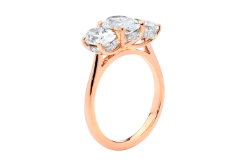 Oval brilliant cut Trilogy available in rose gold. Available in White Gold, Yellow Gold, Rose Gold or Platinum