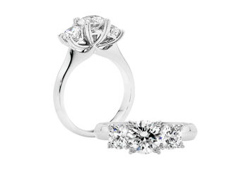 Round brilliant cut Trilogy ring available in white gold or platinum. Available in White Gold, Yellow Gold, Rose Gold or Platinum