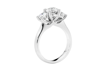 Round brilliant cut Trilogy ring available in white gold or platinum. Available in White Gold, Yellow Gold, Rose Gold or Platinum