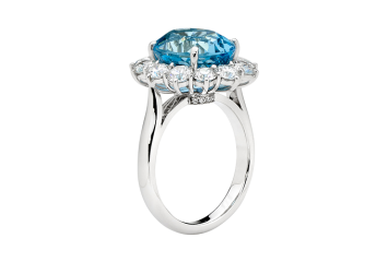 Oval brilliant cut and round brilliant cut aqua cluster diamond ring. Available in White Gold, Yellow Gold, Rose Gold or Platinum