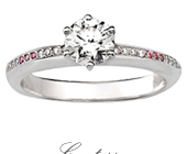 Round Brilliant Cut Diamond Solitaire featuring Pink Diamonds In The Shoulder