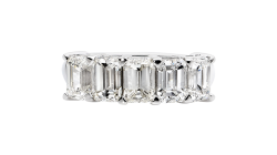 Large emerald cut Eternity ring available in white gold or platinum.