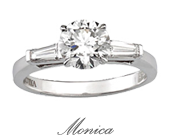 Round Brilliant Cut Diamond Ring featuring Two Tapered Baguette